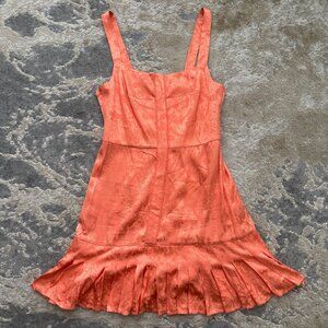 Alexis: Coral Pleated Dress with Satin-Like Finish (Size: S)